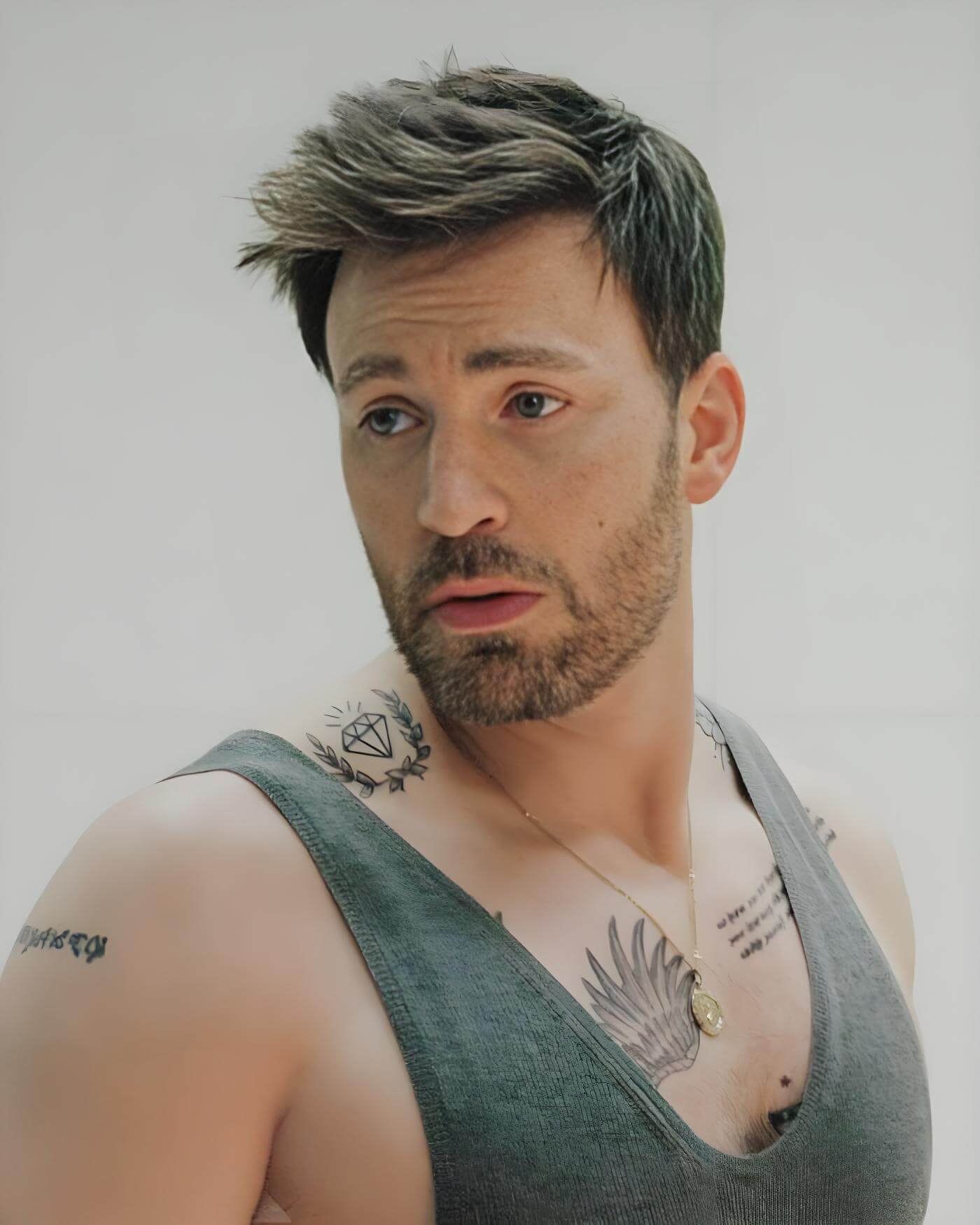 Chris Evans chest tattoos for family