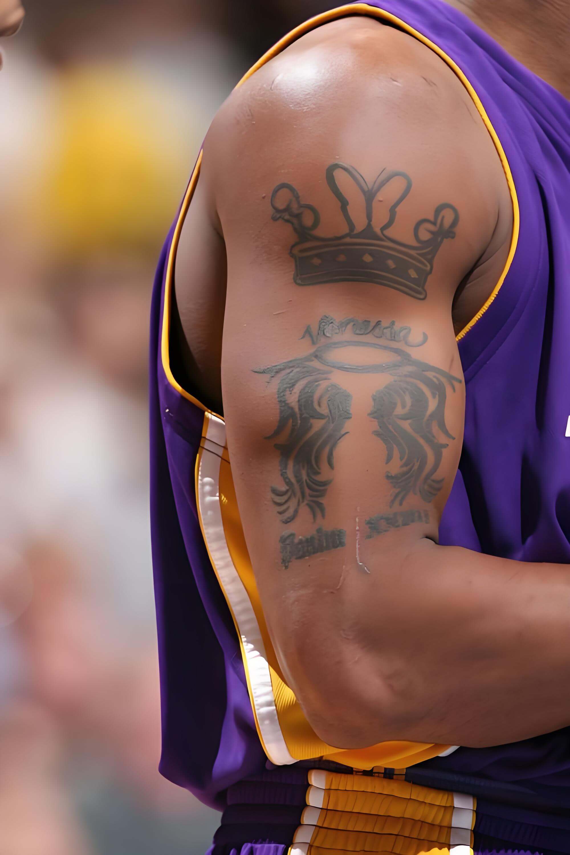Kobe Bryant tattoo of Vanessa with angel wings and crown
