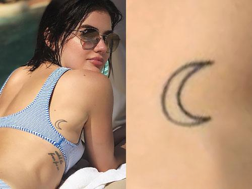 Lucy Hale small word tattoo behind ear