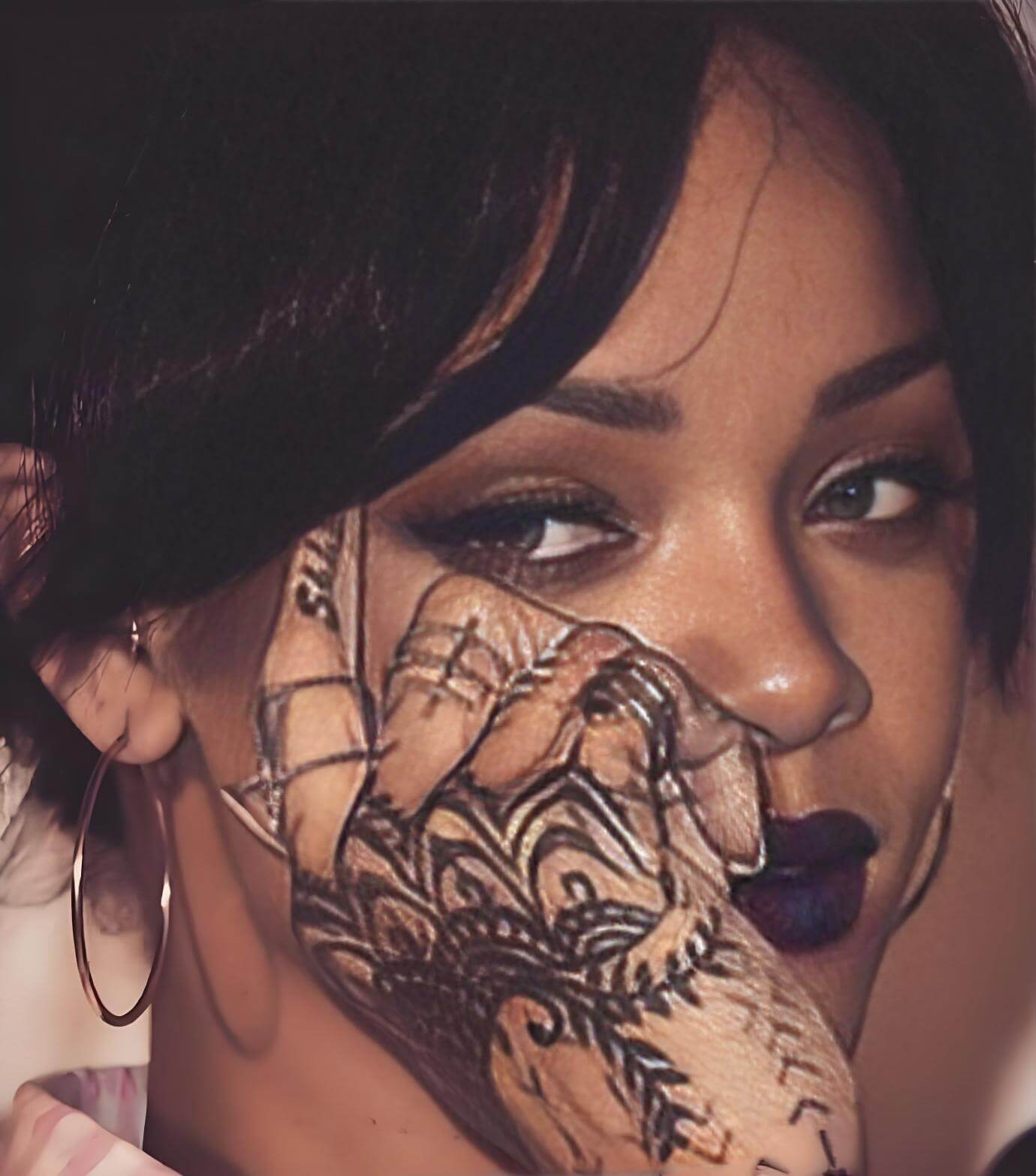 Rihanna underboob tattoo of goddess Isis